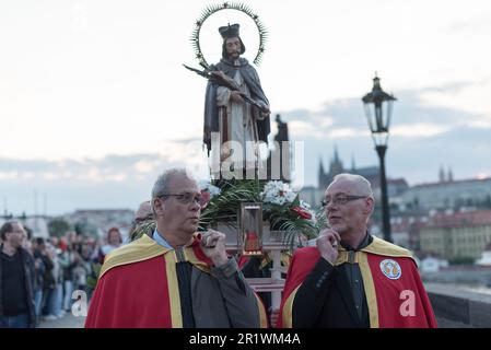 Prague, Czech Republic. 15th May, 2023. Priests carry the statue of Saint John of Nepomuk during the Navalis celebrations on the Charles bridge in Prague. Navalis Saint Johns celebrations take place to commemorate Czech saint and Prague native, Saint John of Nepomuk, patron of all people of the water. (Photo by Tomas Tkacik/SOPA Images/Sipa USA) Credit: Sipa USA/Alamy Live News Stock Photo