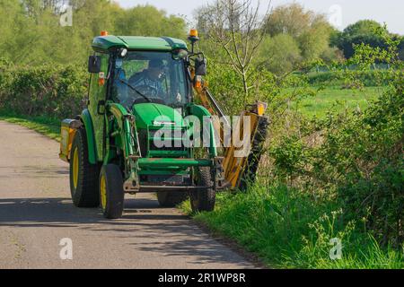 John Deere, compact tractor loader, extendable arms, grass cutting, quick Release, front loader, model, peak performance, small tractor, farm, tractor Stock Photo