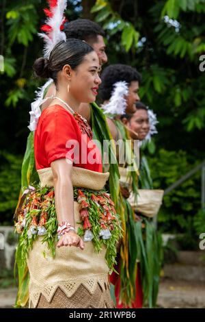 Kingdom of Tonga, Neiafu. Traditional welcome dancers in typical taʻovala, woven mat skirt worn by both men and women. Stock Photo