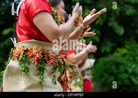 Kingdom of Tonga, Neiafu. Traditional welcome dancers in typical taʻovala, woven mat skirt worn by both men and women. Stock Photo