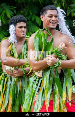 Kingdom of Tonga, Neiafu. Traditional welcome dancers in typical taʻovala, woven mat skirt worn by both men and women. Stock Photo