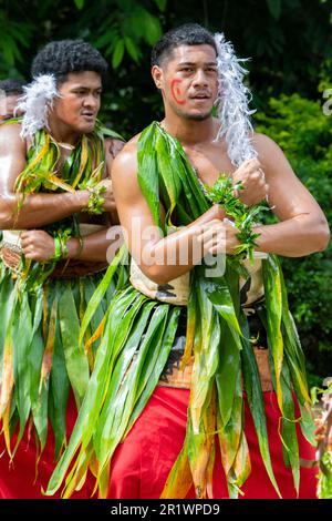 Kingdom of Tonga, Neiafu. Traditional welcome dancers in typical taʻovala, woven mat skirt worn by both men and women. Stock Photo