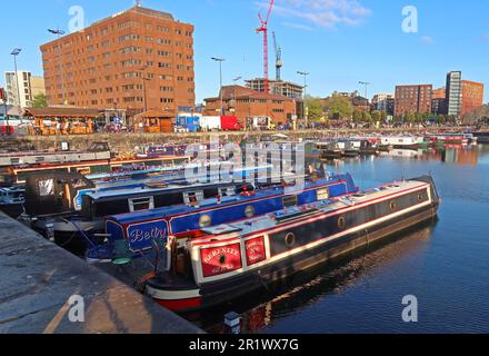 Canal barges & narrowboats, evening moored up at the royal Albert Dock, Liverpool, Merseyside, England, UK, L3 4AF Stock Photo