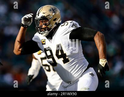 FILE - New Orleans Saints defensive end Scott Patchan (60) runs through  drills during training camp at their NFL football training facility in  Metairie, La., Thursday, Aug. 4, 2022. Guardian Caps helped