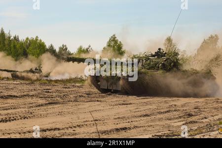 Polish soldiers assigned to the 19th Mechanized Brigade, maneuver a BMP-3 tank while participating in a combined arms rehearsal during Anakonda23 at Nowa Deba, Poland, May 14, 2023. Anakonda23 is Poland's premier national exercise that strives to train, integrate and maintain tactical readiness and increase interoperability in a joint multinational environment, complimenting the 4th Inf. Div.'s mission in Europe, which is to participate in multinational training and exercises across the continent while collaborating with NATO allies and regional security partners to provide combat-credible for Stock Photo