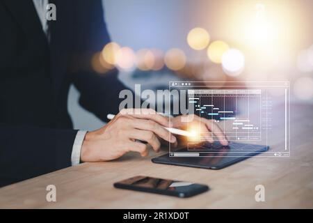 Analyst working or Project management with smartpen and tablet in successful startup business concept. Businessman with Data management system statist Stock Photo