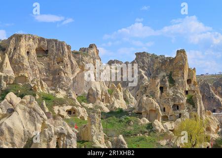 Photo taken in Turkey. The photograph shows the remains of an ancient cave settlement in the mountains of Cappadocia. Stock Photo