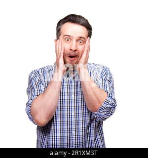 Confidence grows with age. A cropped portrait of a middle-aged man making a face, isolated on white. Stock Photo