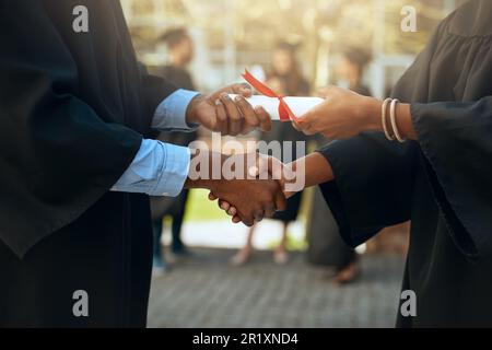 Shaking hands, graduation and certificate for college student with ...