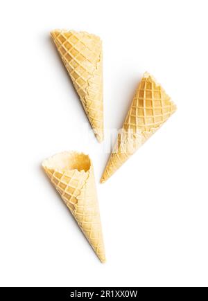 Empty wafer cone. Sweet ice cream cornet isolated on the white background. Stock Photo