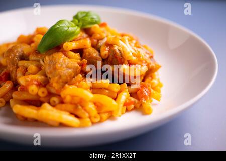 Paella fideua with chicken.Fideuá is a dish originally from Gandía that is  made in a similar way to paella, although based on noodles instead of rice  Stock Photo - Alamy