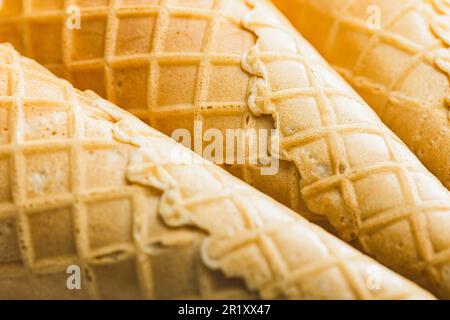Empty wafer cone. Sweet ice cream cornet. Closeup. Stock Photo