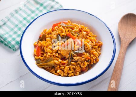 Paella fideua with chicken.Fideuá is a dish originally from Gandía that is  made in a similar way to paella, although based on noodles instead of rice  Stock Photo - Alamy