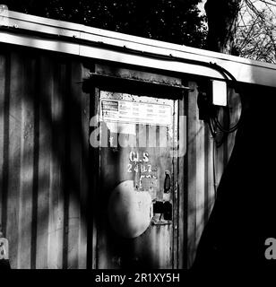 Old Shipping containers used for storage, Peter Symonds College, Winchester, Hampshire, England, United Kingdom Stock Photo