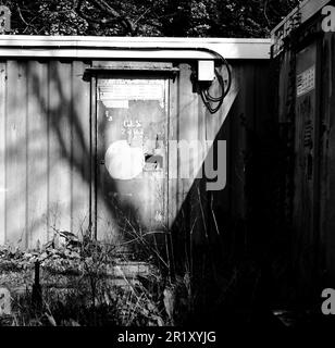 Old Shipping containers used for storage, Peter Symonds College, Winchester, Hampshire, England, United Kingdom Stock Photo