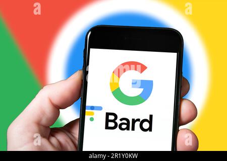 Goggle Bard AI chatbot artificial intelligence. Man with smartphone using Bard Ai website. mobile screen with Bard AI Stock Photo