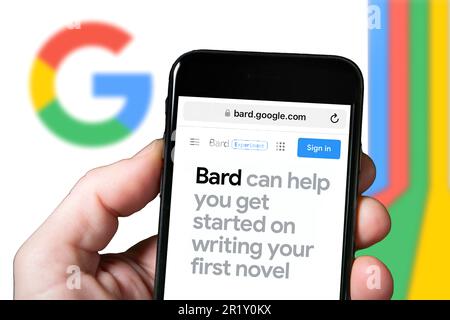 Goggle Bard AI chatbot artificial intelligence. Man with smartphone using Bard Ai website. mobile screen with Bard AI Stock Photo