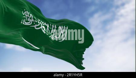 Saudi Arabia national flag waving in the wind on a clear day. Green field with Shahada and sword in Thuluth script. Fluttering fabric. 3d illustration Stock Photo