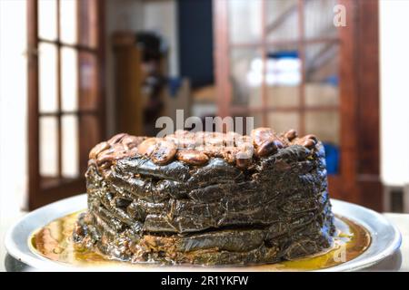 Close-up View of a Mediterranean Food Dish—Grape Leaves Rolled around Rice with beans on Top, Known in Turkey and Syria as Yaprak and as Dolma in Iraq Stock Photo