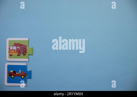 Information puzzles placed on the edge of the blue background. Types of cars. Stock Photo