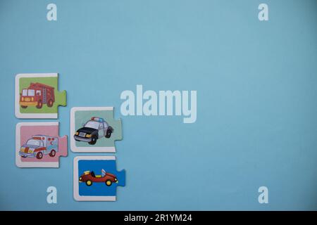 Information puzzles placed on the edge of the blue background. Types of cars. Stock Photo