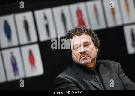 Bad Hersfeld, Germany. 16th May, 2023. Artistic director Joern Hinkel sits in front of costume sketches at the start of rehearsals for the opening play 'King Lear. Shakespeare's drama will premiere at the 72nd Bad Hersfeld Festival on June 30, 2023. Credit: Uwe Zucchi/dpa/Alamy Live News Stock Photo