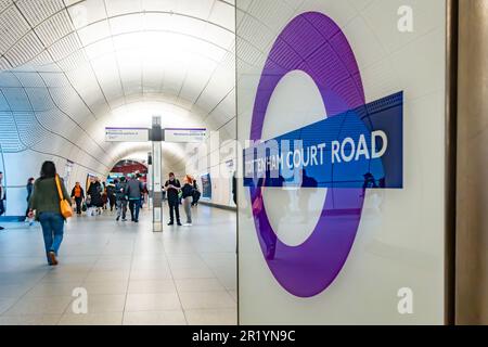 A view along a tunnel at Tottenham Court Road London Underground Station in London, UK Stock Photo