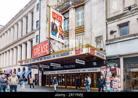 The Dominion Theatre on Tottenham Court Road in London, UK is showing Grease. Stock Photo