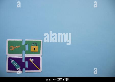 Information puzzle placed on the edge of the blue background. Safety, personal care Stock Photo