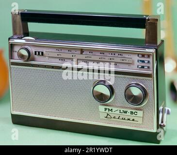 Radio FM/LW. A picture taken in the 1950s- 1960s of a portable transistor radio. On the front of it a scale with knobs to turn to listen to radio stations transmitting on different frequencies.  Sweden 1959. ref BV68-5 Stock Photo