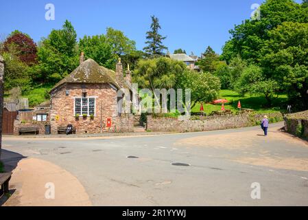 Cockington village, Torquay, Devon in May. School House. Stock Photo