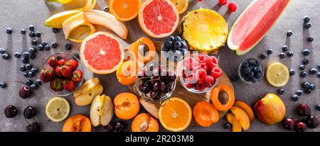 Composition with a variety of fresh culinary fruits Stock Photo