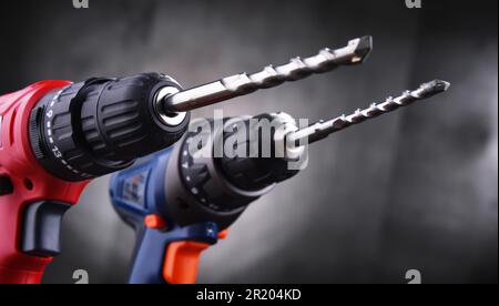 Composition with two cordless drills also working as screw guns Stock Photo