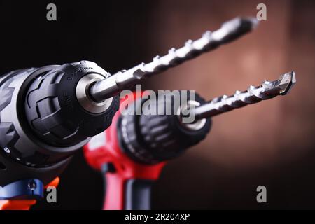 Composition with two cordless drills also working as screw guns Stock Photo