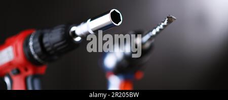 A screw gun and a pistol-grip cordless drill Stock Photo