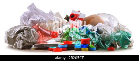 Recyclable garbage consisting of glass, plastic, metal and paper isolated on white Stock Photo