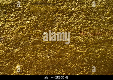 Bronze wall, painted concrete, abstract background, closeup old texture Stock Photo
