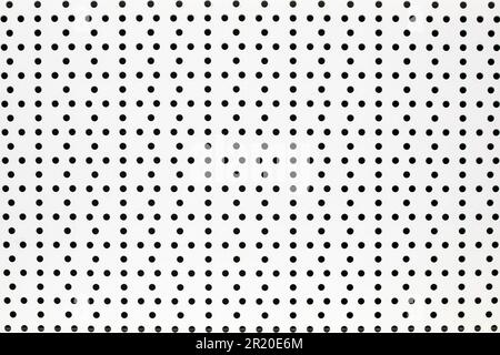 Background of white perforated white painted metal sheet Stock Photo