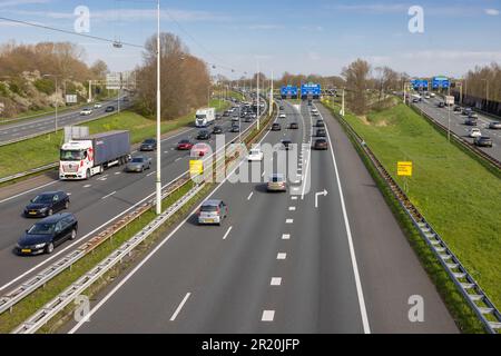 Utrecht, The Netherlands - April 4, 2023: View at Dutch freeway A12 in East direction near cloverleaf Lunetten Stock Photo