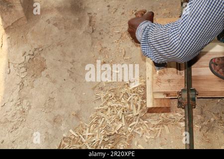 Close up Carpenter busy working - concept of artisans, self employed and skilled labour, India, Odisha Stock Photo