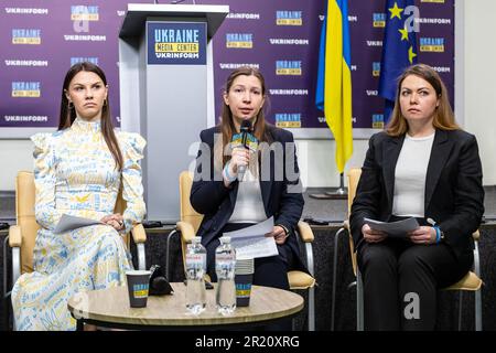 Sofiia Cherepanova, sister of a captured Azovstal defender; Nataliia Zarytska, Chair of the “Women of Steel”; Anastasiia Mikhilova, who was held for two months in an Azovstal bunker with her four-year-old son attend a press conference in Ukrainian Media Centre Ukrinform in central Kyiv, the capital of Ukraine on May 16, 2023. Ukrinform - Ukrainian information agency - hosts a press conference entitled “A year of leaving Azovstal steelworks: cry out, as it's impossible to be silent” by representatives of Women of Steel NGO. Women of Steel is a Ukrainian NGO that gathers mothers, wifes and other Stock Photo