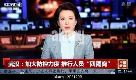 Screengrab from China State Television reporting on the COVID-19 pandemic. Stock Photo