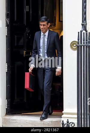 Photograph of Rishi Sunak, Chancellor of the Exchequer, leaving Number 11 Downing Street, London on his way to the UK parliament to deliver his budget, widely referred to in the media as the coronavirus budget. Stock Photo