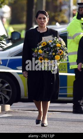 Home Secretary Priti Patel lays a floral tributes near Belfairs Methodist Church in Eastwood Road North, Leigh on Sea, Southend on Sea, Essex after Conservative MP Sir David Amess died having being stabbed multiple times at his constituency surgery. October, 2021. Stock Photo