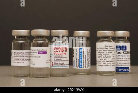 COVID-19 vaccines, from left to right: Pfizer-BioNTech, Oxford-AstraZeneca, Moderna, Johnson & Johnson [Janssen], and Sputnik V. SARS-COV2, 2019-nCoV or COVID-19 is a contagious virus that causes respiratory infection. May 2021. Stock Photo