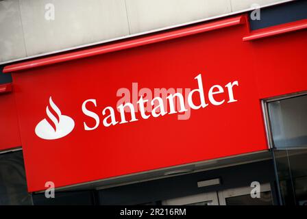 A Santander sign on a UK high street. Santander UK plc is a wholly-owned subsidiary of the Spanish Grupo Santander. Based in the United Kingdom, it operates under the name of Santander. Santander UK plc was formed by the renaming of Abbey National plc which also included the branch network and savings business of Bradford & Bingley plc on 11 January 2010. Alliance & Leicester plc merged into the bank on the 28th May 2010, and rebranding is expected by the end of November 2010. Stock Photo
