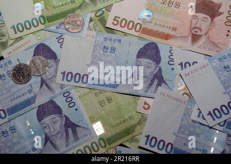 The Korean won. The South Korean won, officially the Korean Republic won is the official currency of South Korea. A single won is divided into 100 jeon, the monetary subunit. The jeon is no longer used for everyday transactions, and it appears only in foreign exchange rates. Stock Photo