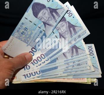 The Korean won. The South Korean won, officially the Korean Republic won is the official currency of South Korea. A single won is divided into 100 jeon, the monetary subunit. The jeon is no longer used for everyday transactions, and it appears only in foreign exchange rates. Stock Photo