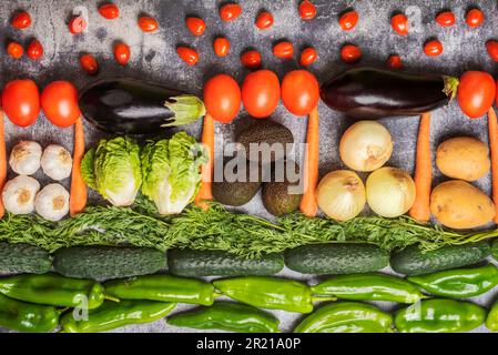 Background created with vegetables and some fruit, mostly green and red colors. Stock Photo