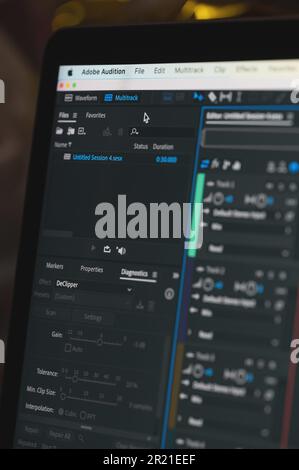 New york, USA - April 7, 2023: Adobe Audition audio editor software menu with tools on computer screen close up view Stock Photo